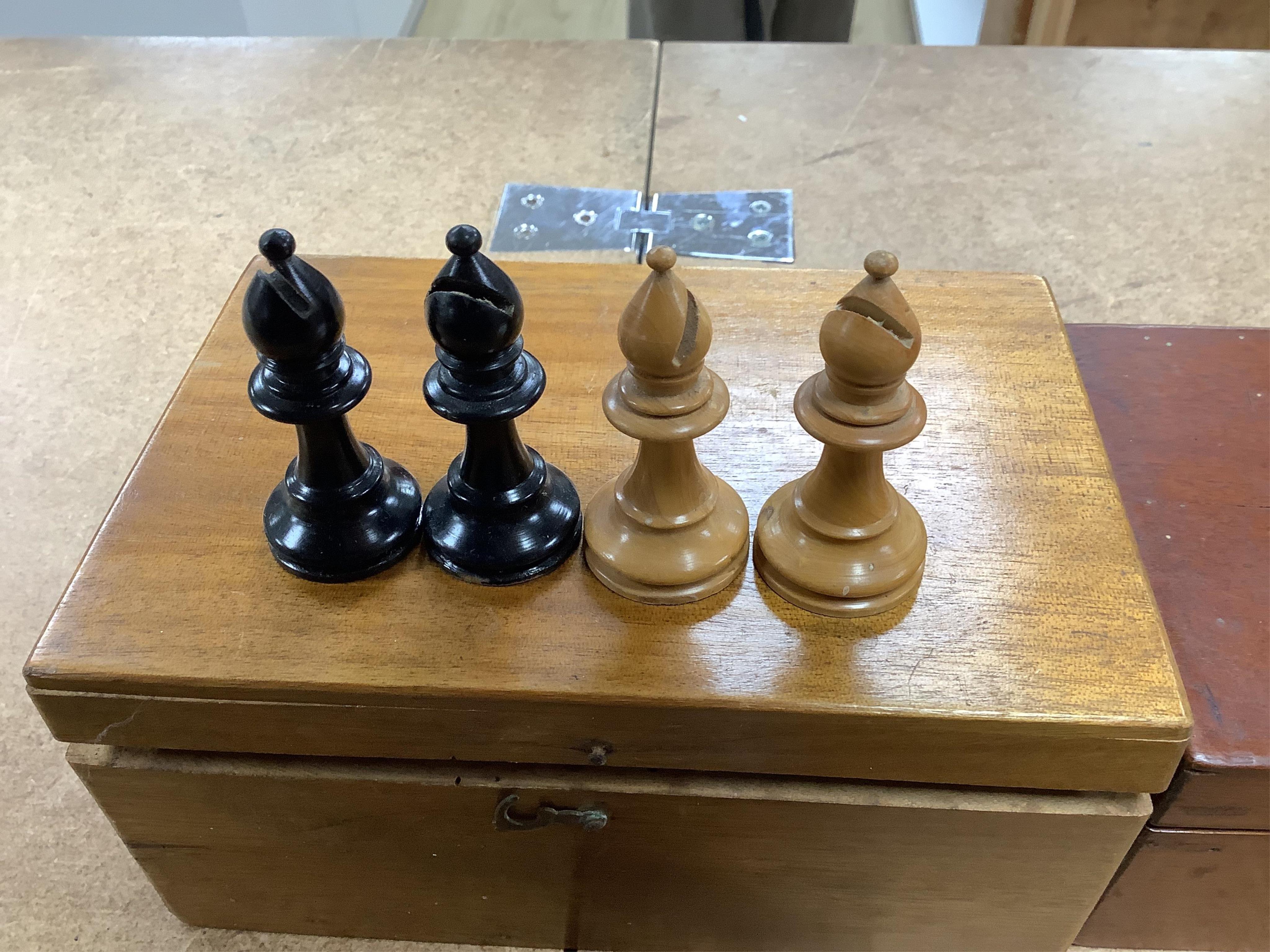 A chess set, possibly F H Ayres, in a mahogany box, and another larger weighted chess set, in box, Ayres Kings 6cm. Condition - good